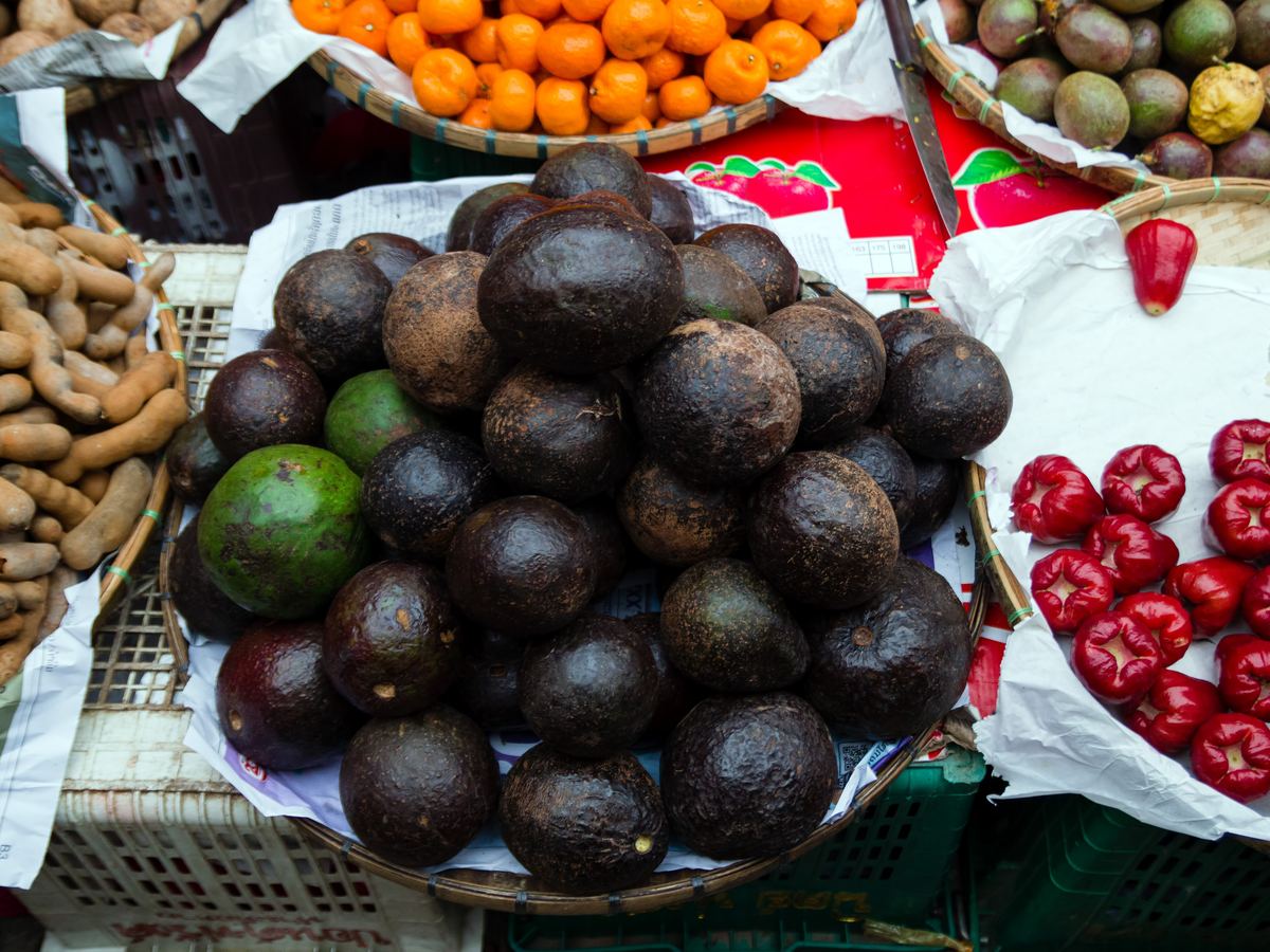 Fresh produce piled high on a Brazilian street-market stall