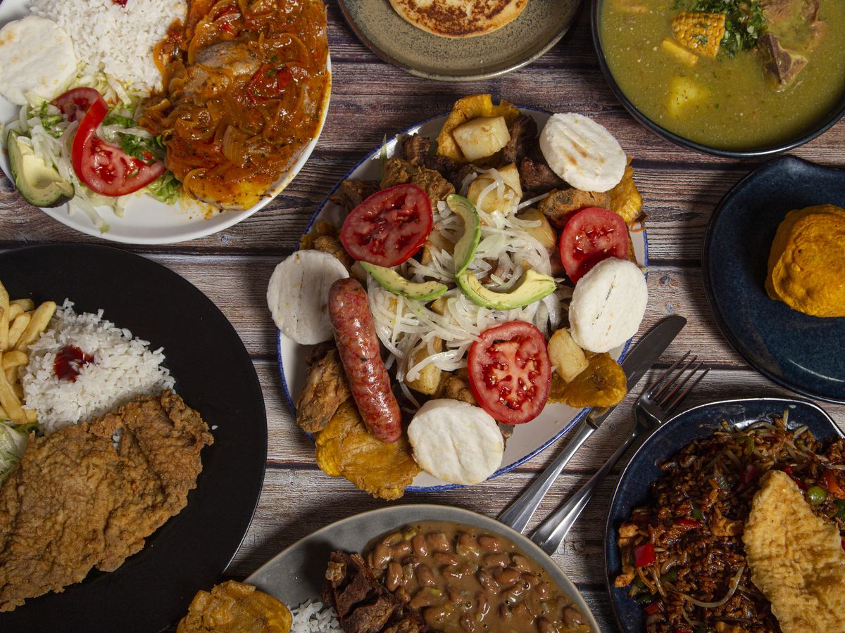 Traditional Chilean dishes served on a wooden table