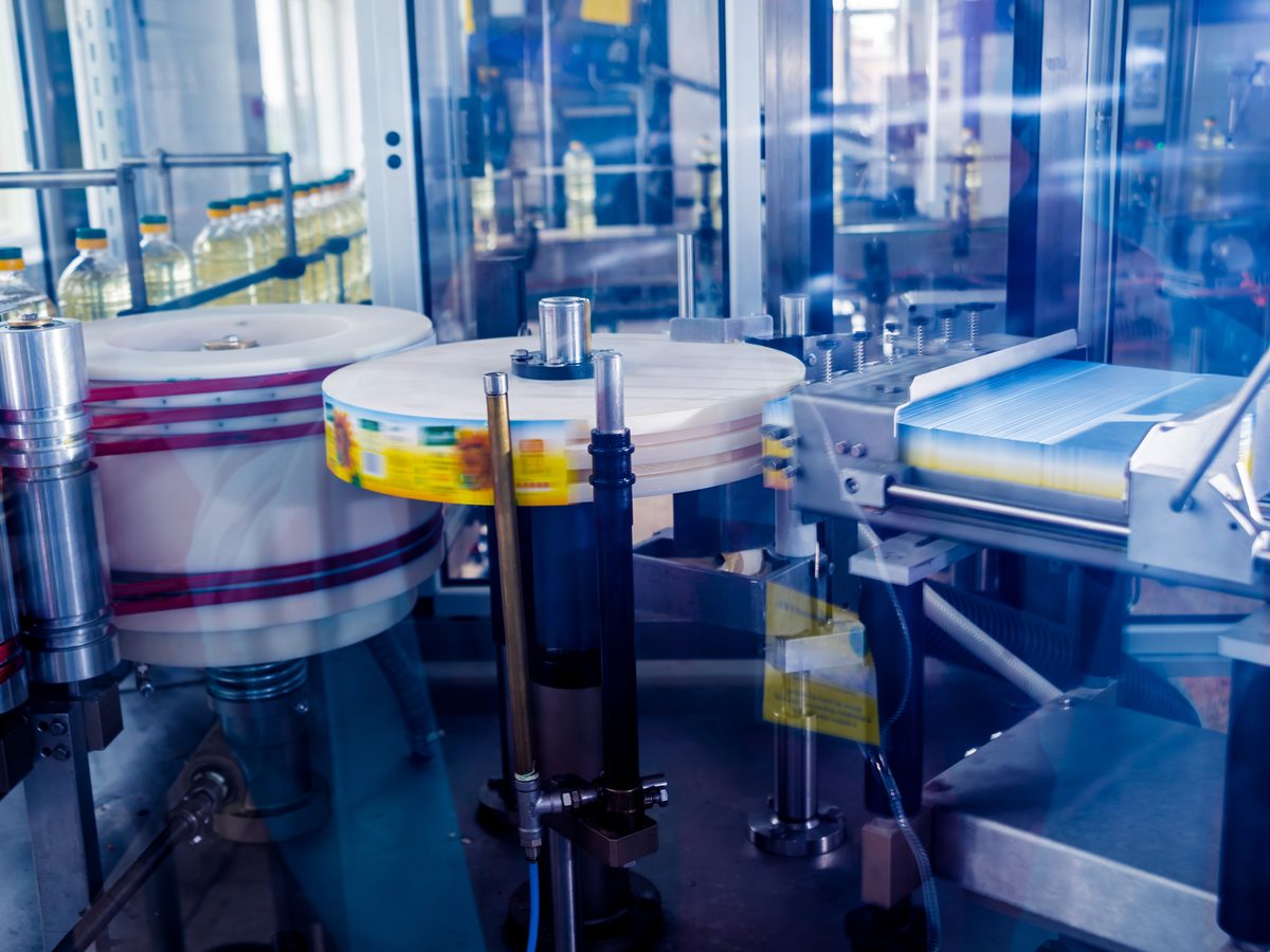 An automated labelling machine running on a food production line