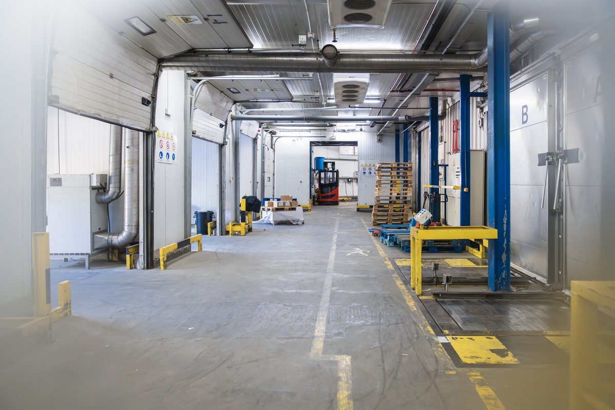 Interior of a cold storage warehouse with multiple loading bays